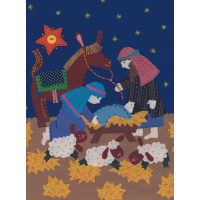 A rectangular Christmas card with a nativity scene on it. The scene is made out of different pieces of fabric, with stitches and buttons visible.